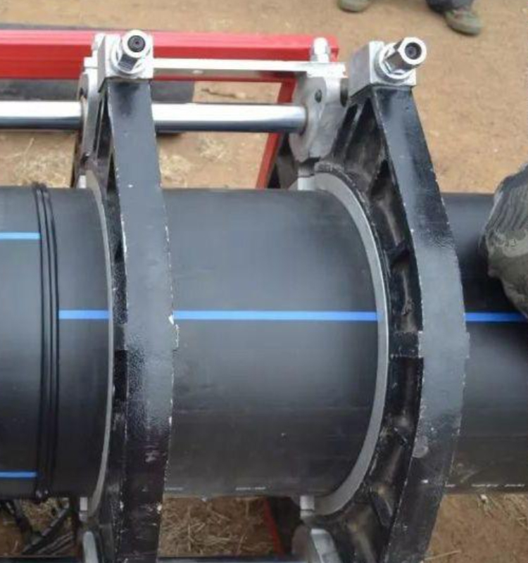 Welding HDPE pipe using HDPE butt welding machine