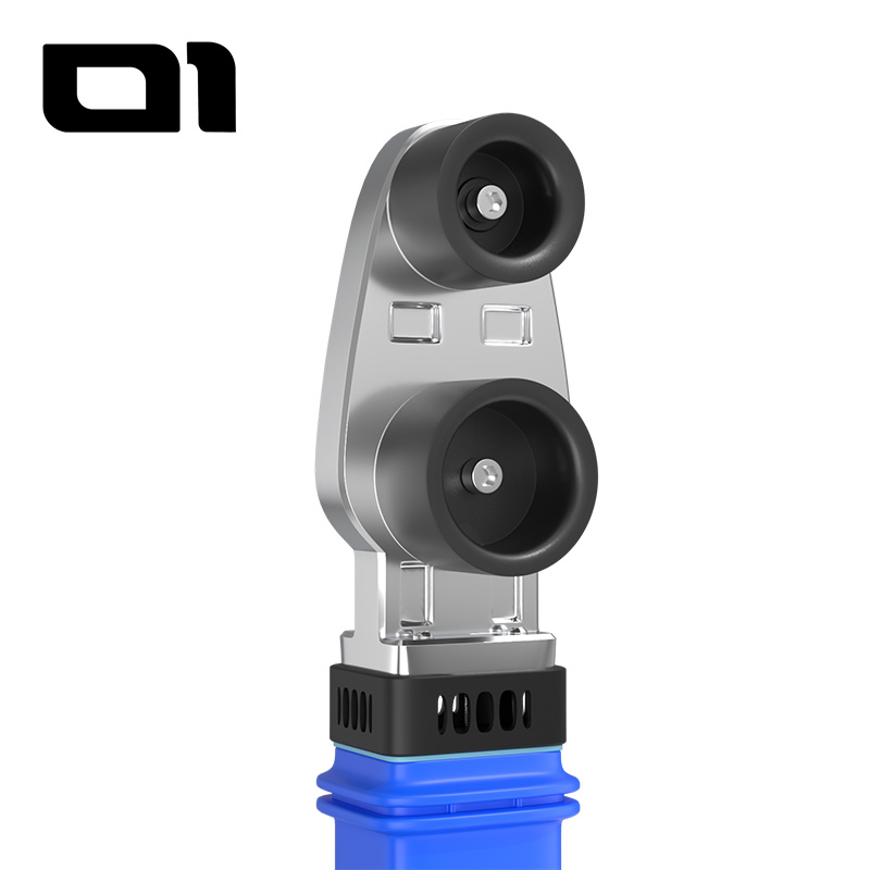 Close-up of a plastic pipe heat fuser showing the black heated welder die with slots and screw holes for mounting the welding die.